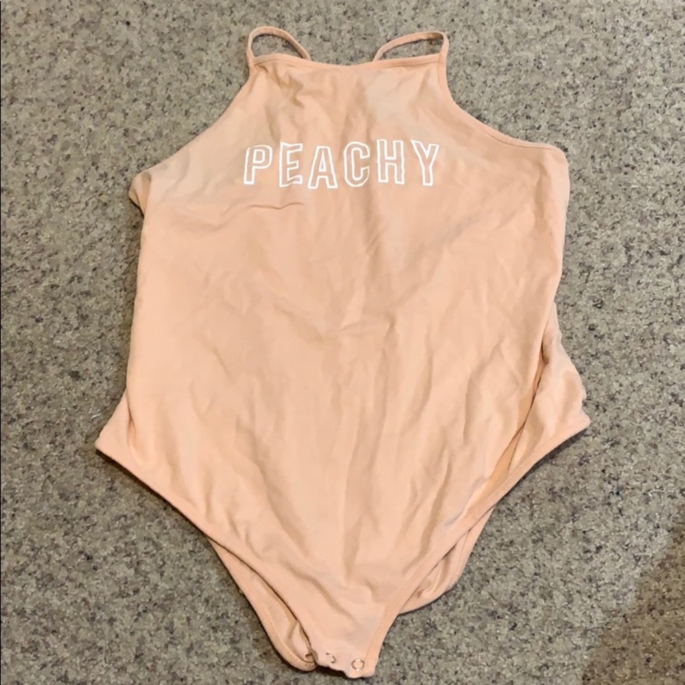 “peachy” body suit